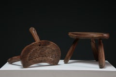 Pair of French Brutalist tripod stools, 1950s
