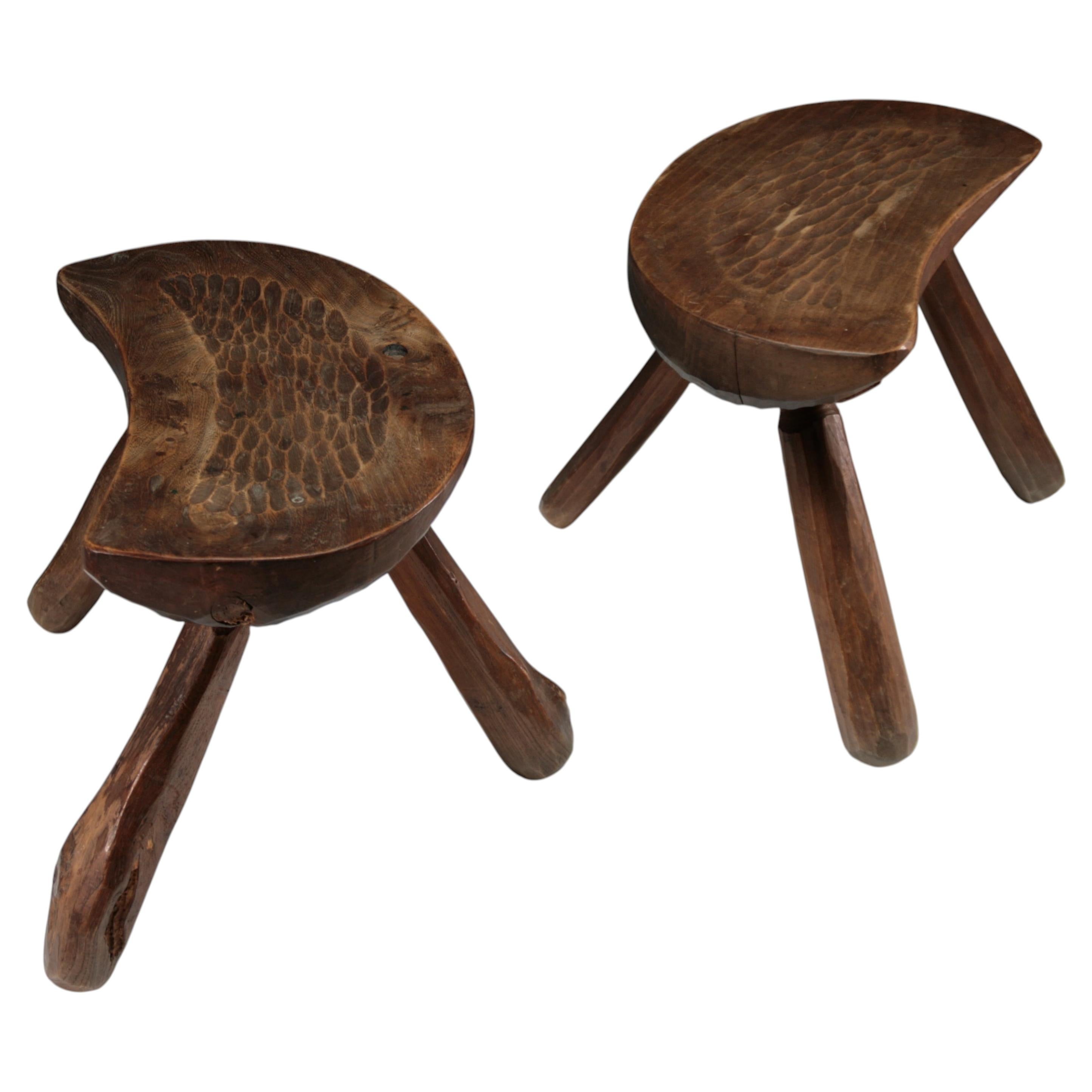 Pair of French Brutalist tripod stools, 1950s