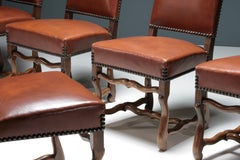 Set of 8 Louis XIII-style camel leather chairs, France