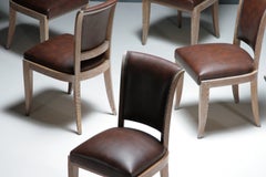 Set of 8 chairs in cerused oak and faux leather, France, 1940s