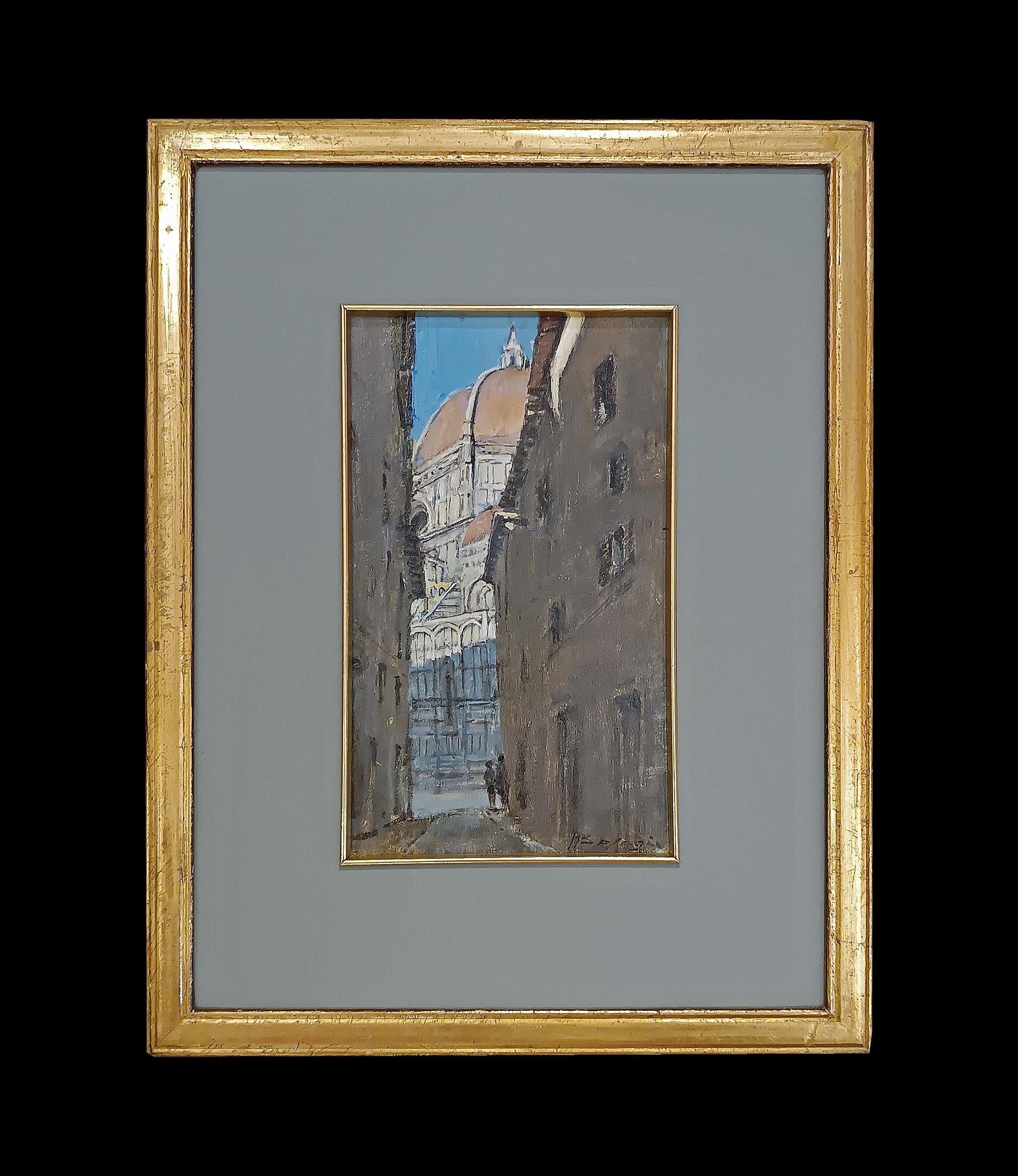 Beautiful oil painting on a panel, inserted in a gilded frame with a wooden passe-partout. The work depicts a glimpse of a street in Florence, with the dome of the Cathedral of Santa Maria del Fiore in the background. Two figures are also visible in