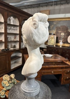 EARLY 19th CENTURY MARBLE BUST OF A YOUNG WOMAN