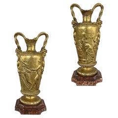 PAR DE JARRONES DE BRONCE DE ESTILO BARBEDIENNE DE LA PRIMERA MITAD DEL SIGLO XIX