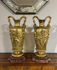 PAR DE JARRONES DE BRONCE DE ESTILO BARBEDIENNE DE LA PRIMERA MITAD DEL SIGLO XIX