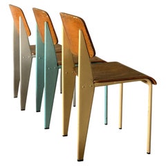Set of Eight Vintage Dining Chairs In the manner of Jean Prouvé, France c. 1960s