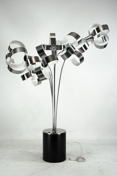 Italian Space Age Floor lamp with metal floral shades. Italy 1970s