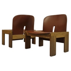 Pair of 925 armchairs by A. & T. Scarpa for Cassina, 1966, Italy; wood and leather.