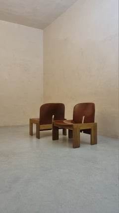Pair of 925 armchairs by A. & T. Scarpa for Cassina, 1966, Italy; wood and leather.