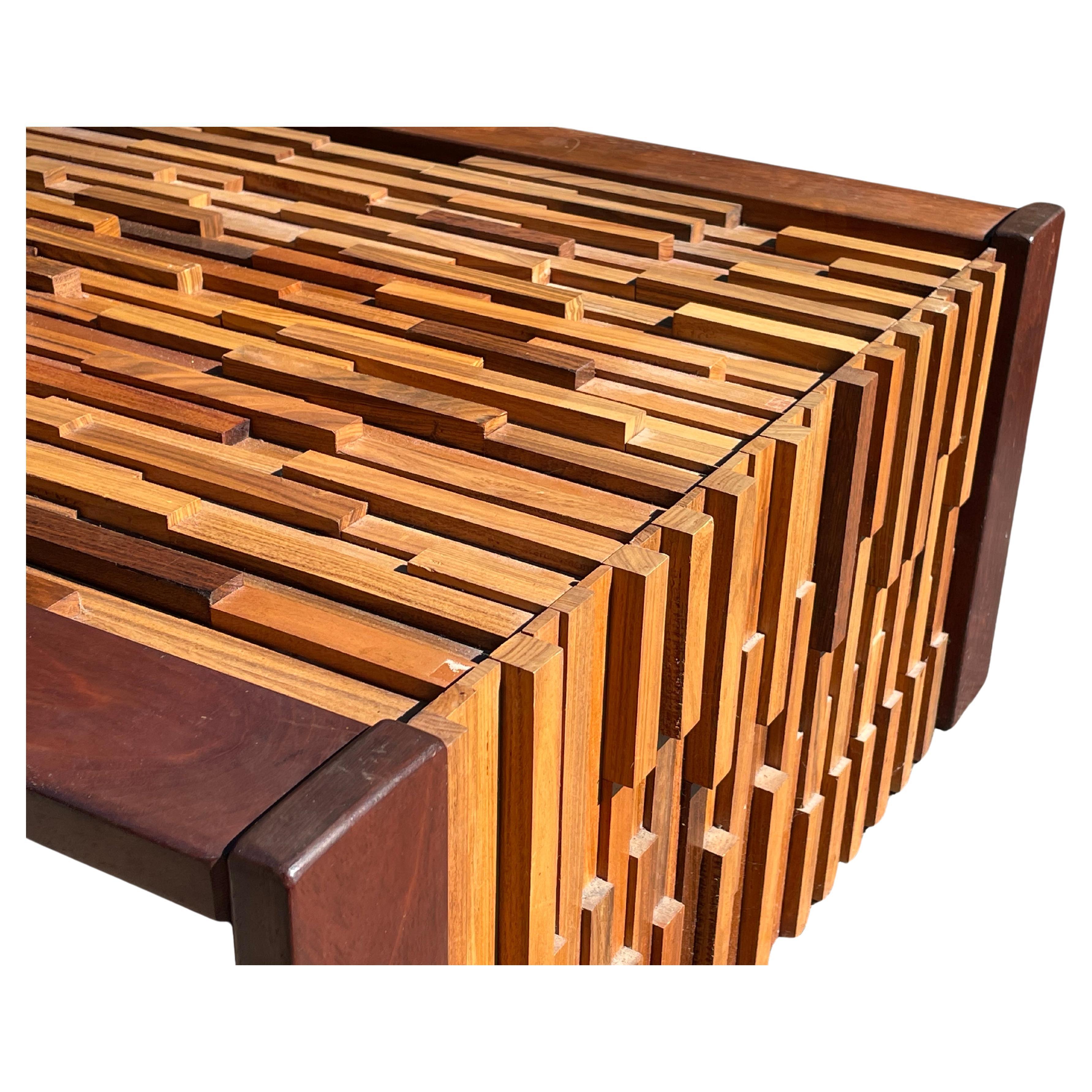 Sculptural cocktail table designed by Percival Lafer, Brazil, 1960s. 

This iconic coffee table is one of Lafer's most famous designs and was made of various tropical hardwood including rosewood, teak and jacaranda in different heights and lengths