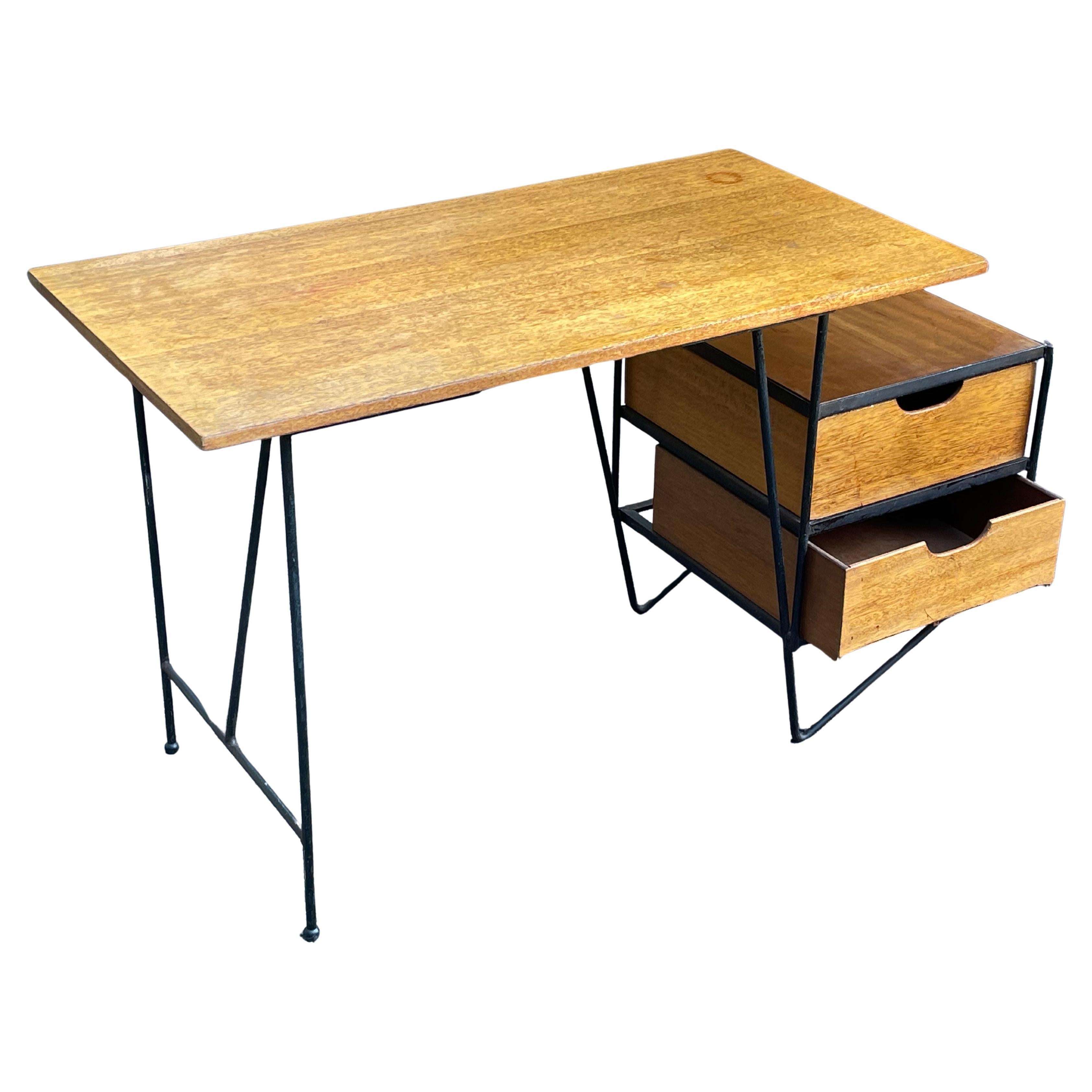 Modern iron frame mid-century desk with floating mahogany top and drawers designed by D.R. Bates & Jackson Gregory Jr. for Vista of California. 

This hard-to-find vintage desk can be positioned with the drawers on either the right or left side of