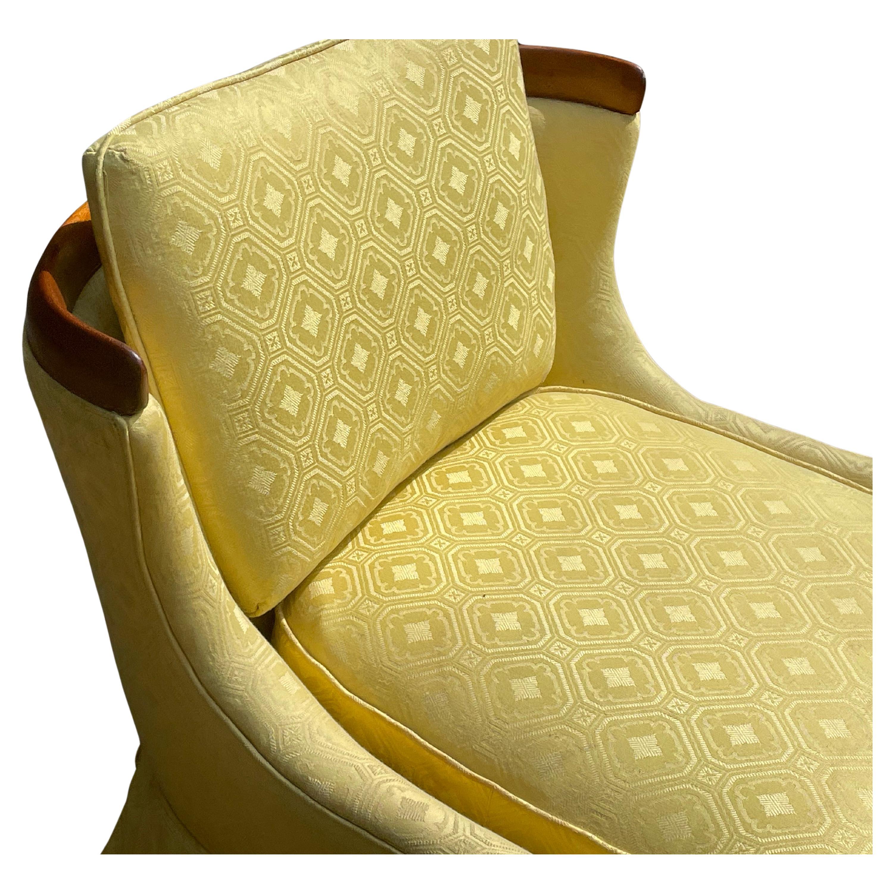 Vintage Sophisticate Walnut Lounge Chair by Erwin Lambeth for Tomlinson, circa 1950s.

This sculptural chair features a solid walnut back that offers a graceful view from any angle. 

Original yellow fabric is in very good condition with a small