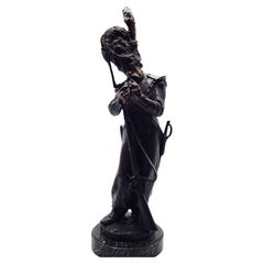 Sculpture en bronze "Grenadier à la baïonnette allumant sa pipe" par Antoine Bofill