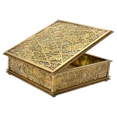 Decorative box by Tiffany Studios New York in bronze and and Slag Glass