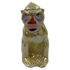 Figurita de mandril de porcelana alemana de mediados de siglo, con la marca «Germany»