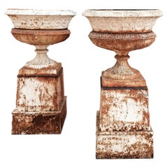 Pair of Antique Late 19th Century Cast Iron Garden Urns on Tall Plinth Bases
