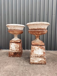 Pair of Antique Late 19th Century Cast Iron Garden Urns on Tall Plinth Bases