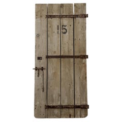 Early 20th Century Reclaimed 4-Board French Barn Door with Iron Strap Hardware
