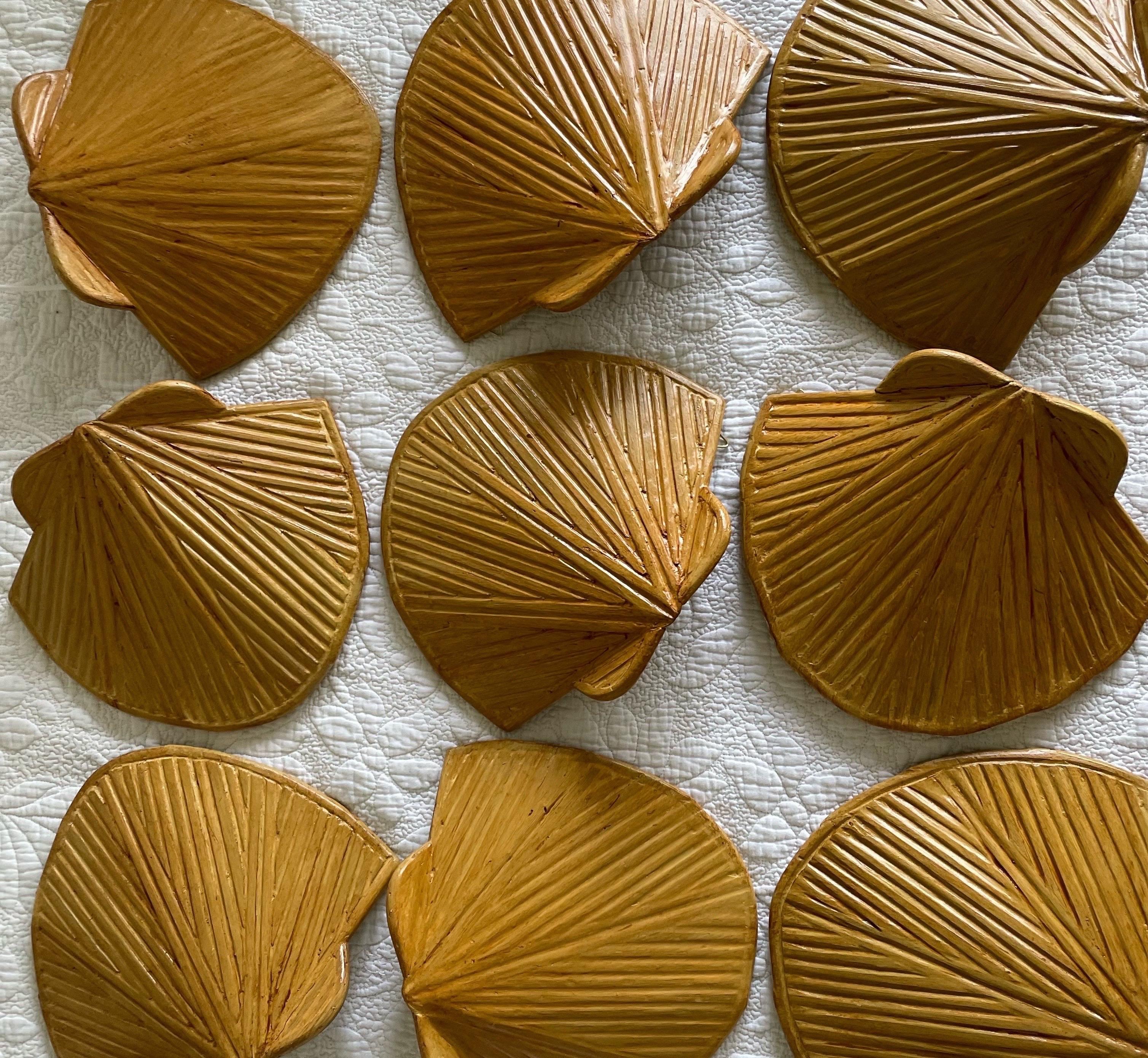 Mid-century modern shell-shaped rattan wall lamps with a French Parisian design can add a touch of elegance and style to any space. These lamps often feature a combination of rattan material, which provides a natural and organic feel, and a unique