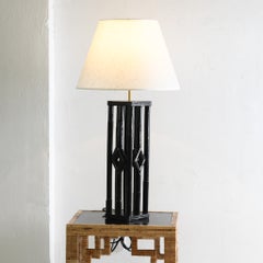 Lampada da tavolo in rattan laccato nero in stile Coloni