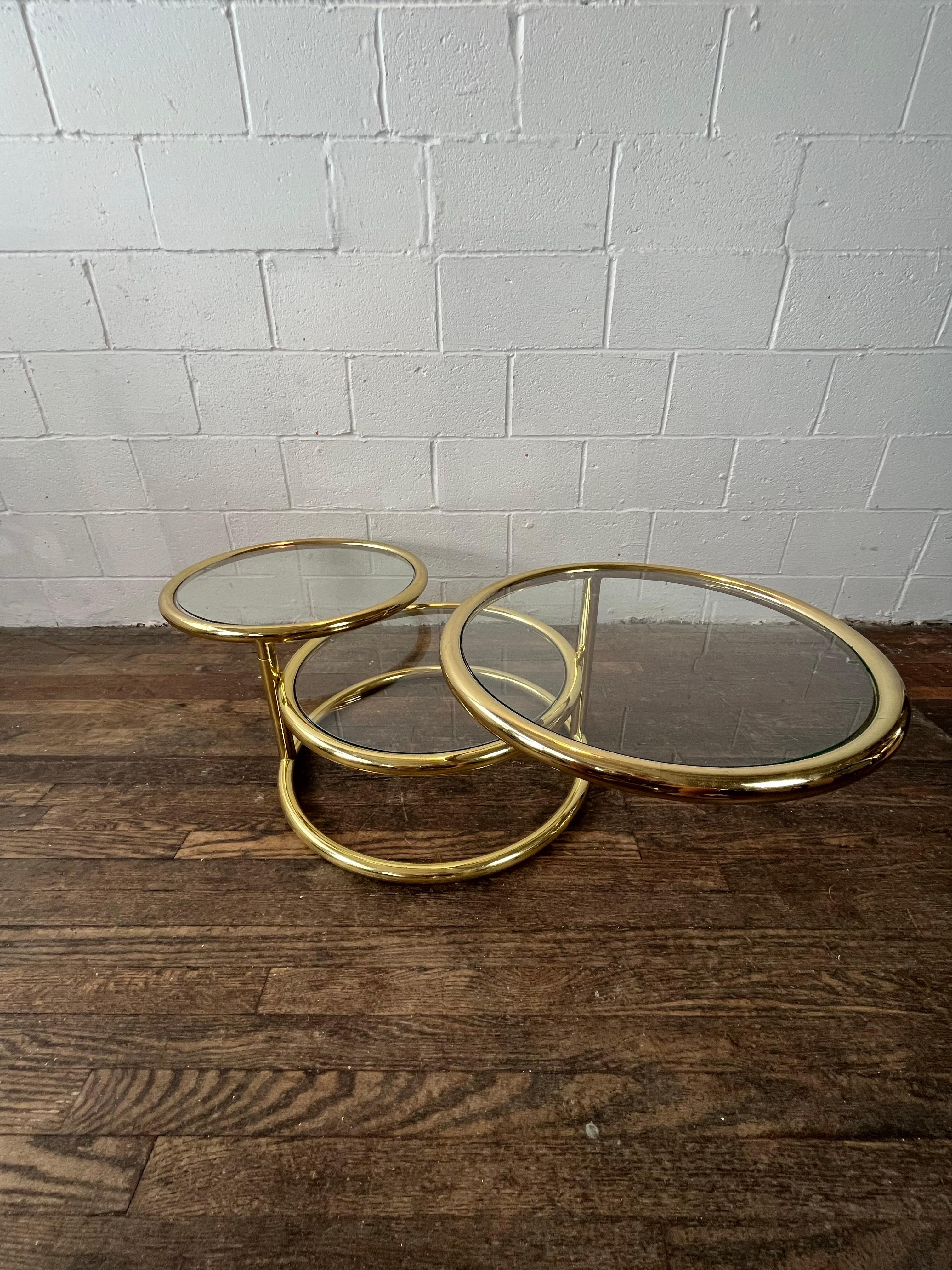 Hollywood Regency Vintage Milo Baughman Style Three-Tier Brass Swivel Coffee Table For Sale