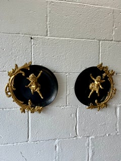 Pair of Italian Rococo Gilt-Metal Cherub Wall Plaques, circa 1950s