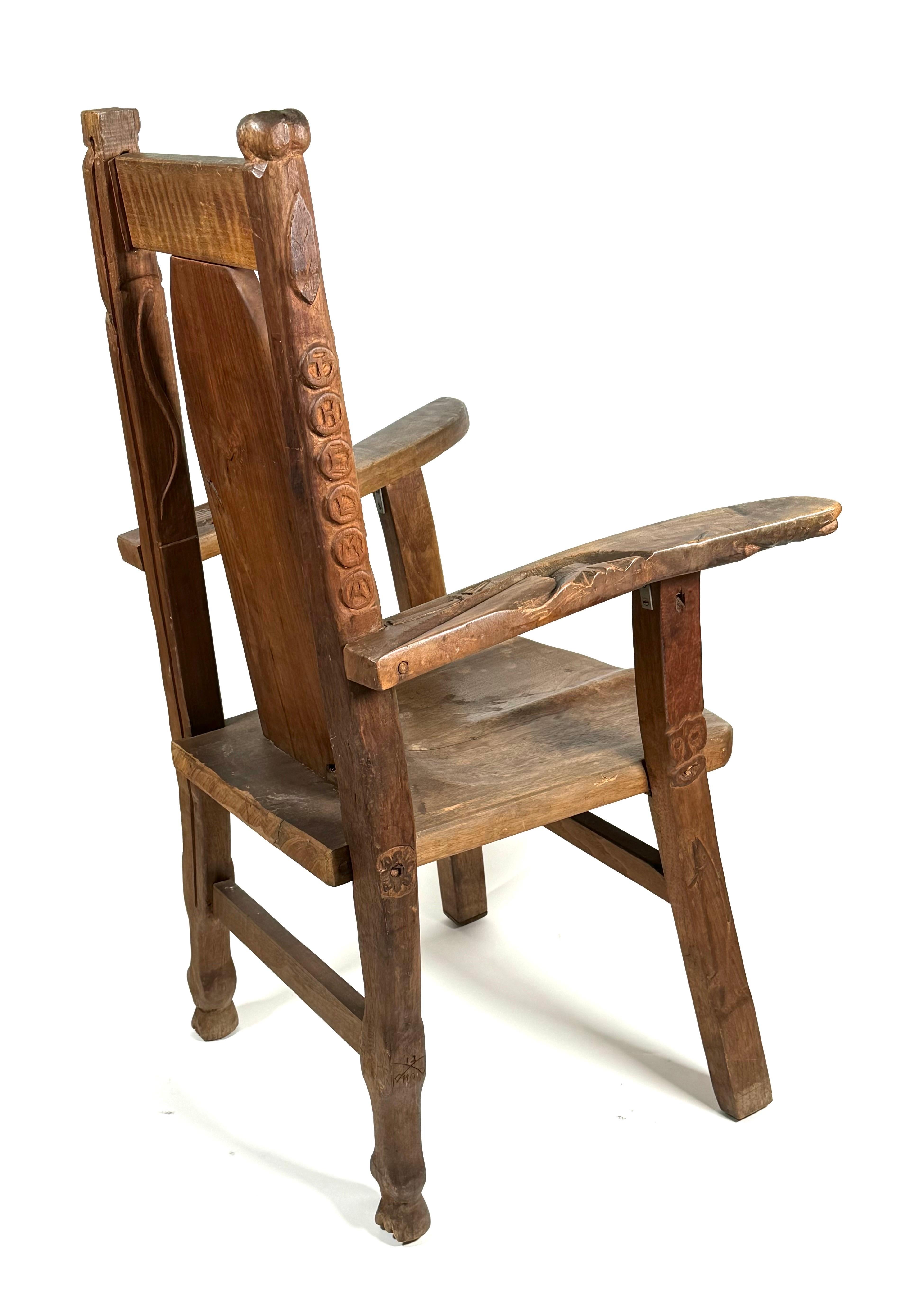 Hardwood Early 20th Century 1918 Folk Art Hand Carved Armchair with Carved Imagery For Sale