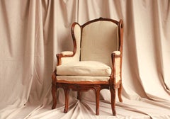 Antique Louis XV Style Armchair in Carved Walnut Wood, with Extendable Feet