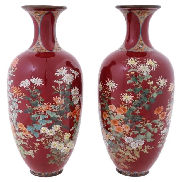 A Large Rare Pair Of Red Japanese Cloisonne Enamel Vases Gardens in Bloom Kawade For Sale