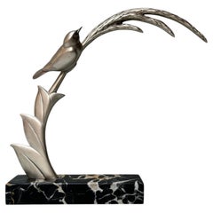Scultura Art Déco firmata E. Guy
