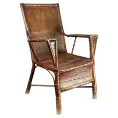 Poltrona in stile coloniale Art Déco in rattan, ecopelle e tela cerata, in stile wabi-sabi, anni '20