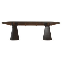 Impressa, Dining table made of Lava Stone, Solid Wood & Laminated Smoked Glass Impressa, Dining table made of Lava Stone, Solid Wood & Laminated Smoked Glass
