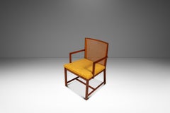 Fauteuil rare à dossier en rotin, signé Michael Taylor pour Baker Furniture, États-Unis, vers les années 1960
