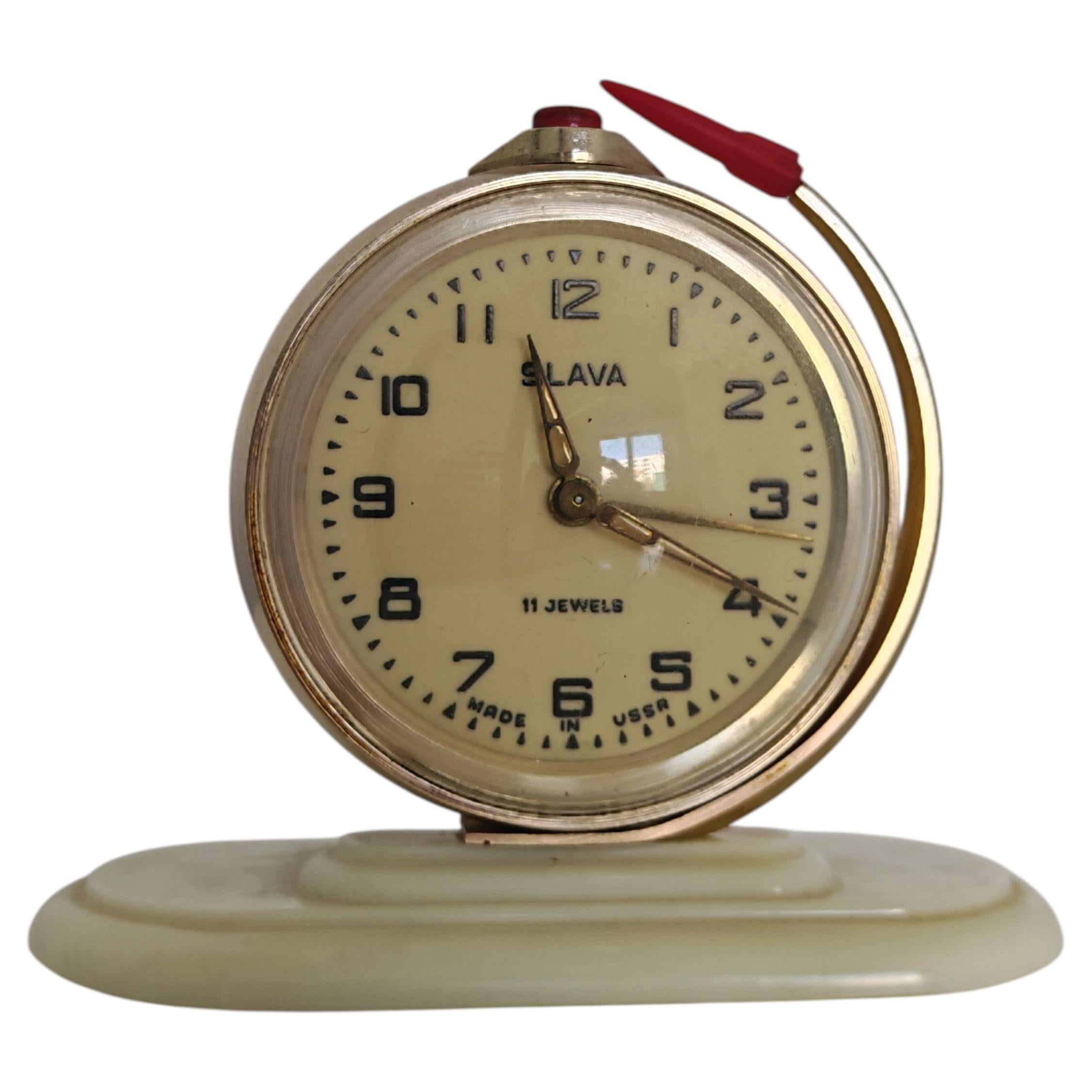 How does a mechanical alarm clock work?