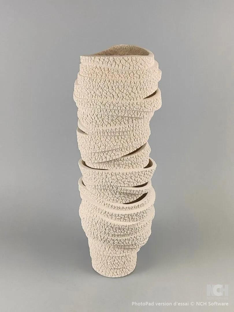 .Gilles Caffier (1963) large tubular ceramic vase textured with elephant skin stripes
glass interior
signed and dated 2012
numbered 4/13/40

Gilles Caffier is a French designer, born in 1963. He was, among other things, artistic director of the S