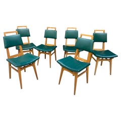 Suite de 6 chaises en chêne, vers 1950.