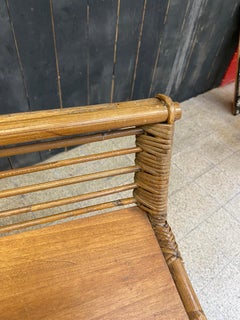 Charming little desk or console in bamboo and wood in the style of Louis Sognot