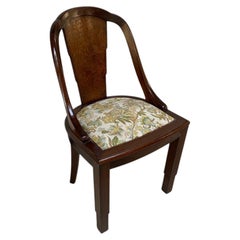 Elegant Art Deco chair, in solid rosewood and amboyna burl circa 1930.