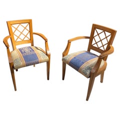 2 fauteuils Art déco en chêne datant de 1940, dans le style de Jacques Adnet.