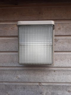 Important set of 16 sconces in cast aluminum lacquered and "holophane" glass.