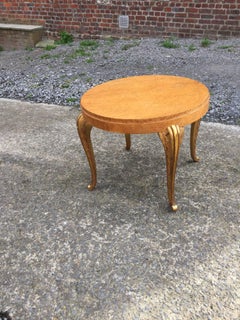 Maison Jansen, Art Deco Gueridon in lemon tree veneer and giltwood, circa 1940.