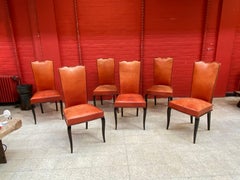 Set of 6 elegants French Art Deco chairs in blackened wood and red leather