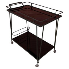 Carrello o carrellino da bar in ferro battuto laccato, vassoi in "Marbrite" opalino nero