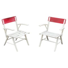 2 garden or veranda armchairs in lacquered wood, circa 1950-1960.