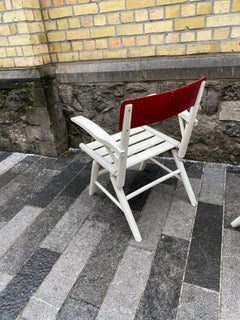 2 garden or veranda armchairs in lacquered wood, circa 1950-1960.
