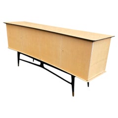 Sideboard in ash veneer, blackened wood and brass in the style of Maison Raphael