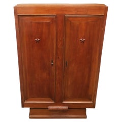 Art Deco walnut cabinet in the style of Maxime Old.