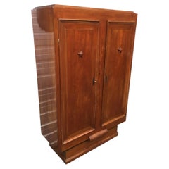 Art Deco walnut cabinet in the style of Maxime Old.