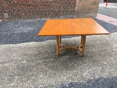 André Arbus, table rectangulaire pivotante en chêne cérusé.