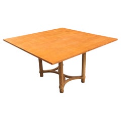 André Arbus, table rectangulaire pivotante en chêne cérusé.