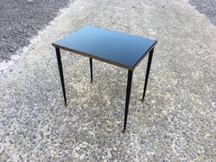 Table d'appoint élégante de style René Prou en métal laqué et doré, vers 1940